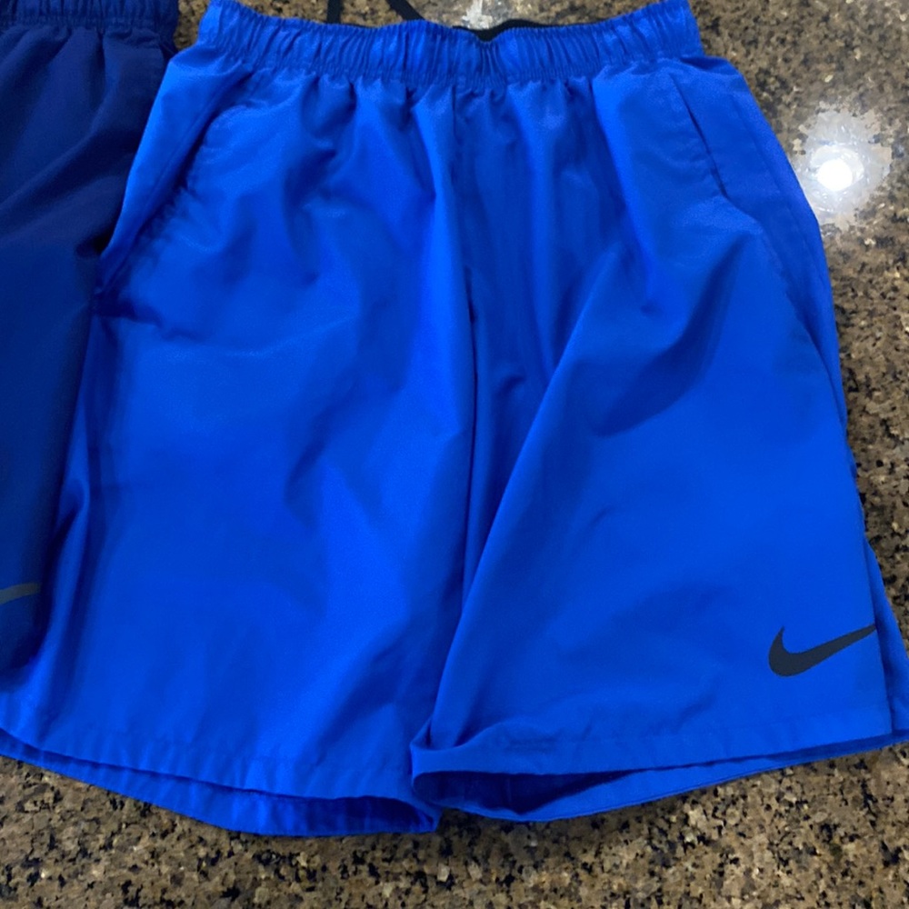 Two pairs of Nike men’s DryFit shorts, excellent condition, size medium